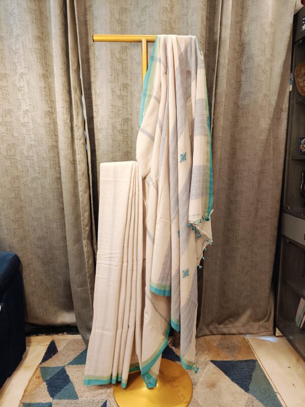 off white cotton saree with turquoise border handloom