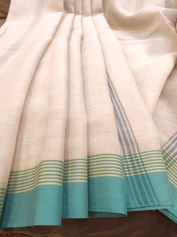 off white cotton saree with turquoise border handloom - saree pleates