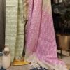 green pink saree close-up handloom weave texture