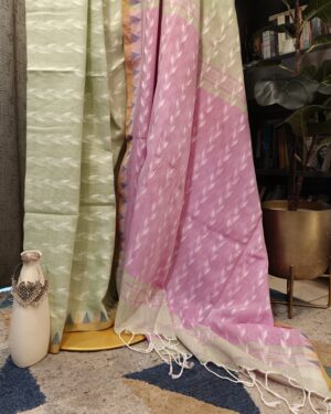 green pink saree close-up handloom weave texture