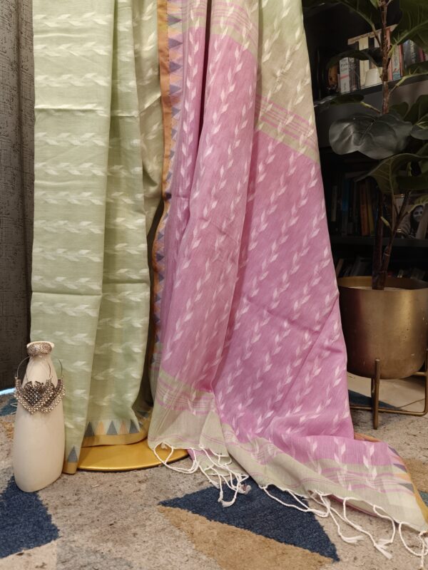 green pink saree close-up handloom weave texture
